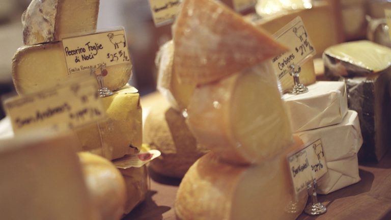 Stacks of cheese at cheeseshop